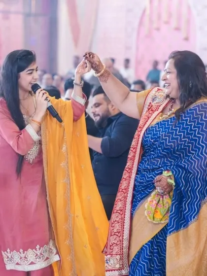 A sweet, interactive moment with a guest during a performance. These personal connections are the most rewarding part of my work.