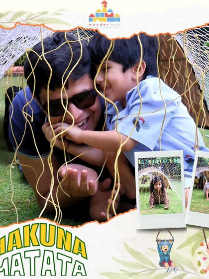 The joy of shared adventure. A father and son share a laugh while crawling through a play tunnel during our adventure camp.