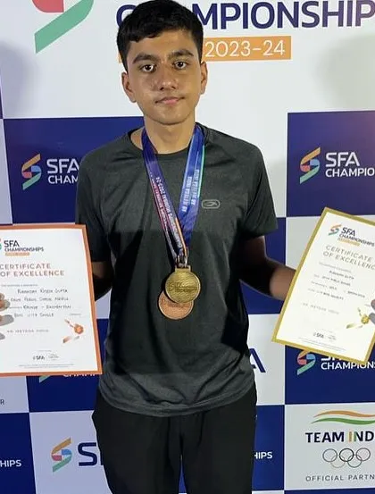 Master Puranjay Gupta with his Gold and Bronze medals from the SFA Championship 2023. He excelled in both U17 Doubles and Singles.