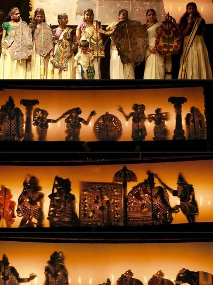 More scenes from a shadow puppet performance at the Dhaatu International Puppet Festival. The warm glow of the light behind the screen brings the detailed cutouts of the puppets to life.