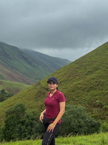 A solo trekker enjoying the vastness of the Kudremukha landscape. Our treks are a great way to find solitude in nature.