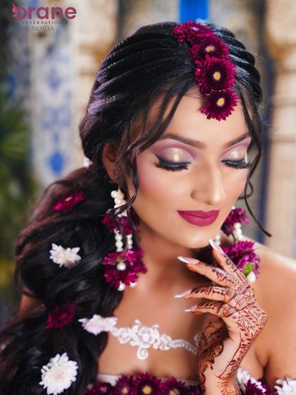 A Shakuntala-inspired look, featuring a blouse and jewelry made entirely of fresh flowers, showcasing creativity and unconventional materials.