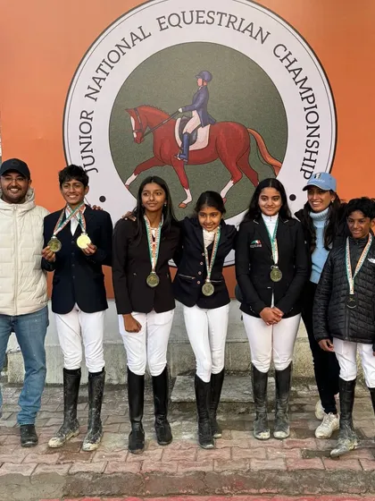 A small but mighty team returns home with medals from the Junior Nationals. This photo celebrates the success of my young riders, including multiple gold and silver medalists.