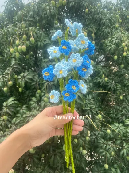 A custom bouquet of blue forget-me-nots in two shades.