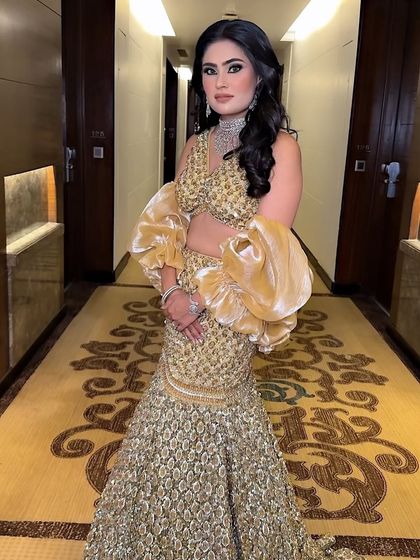 The complete look. This client is ready to shine at her event with makeup that is both glamorous and elegant.