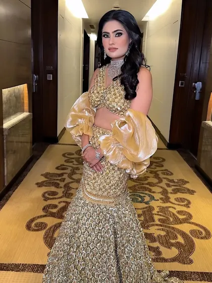 This pose captures the beautiful movement of the lehenga and the confidence the right glam gives you. The makeup remains flawless, highlighting her features without looking heavy.