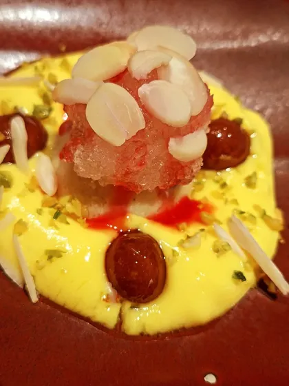 A modern take on a traditional Indian dessert at Loya, featuring multiple textures and flavors.