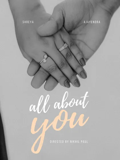 A symbolic shot of hands intertwined, with a custom title card for the couple's film. This image from a Jaipur shoot represents the promise and connection at the heart of their story.