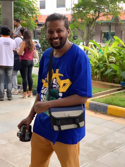 One of our dedicated volunteer photographers, or 'voluntographers', capturing the magic of Sign Fest. Their work helps us share our story with the world.