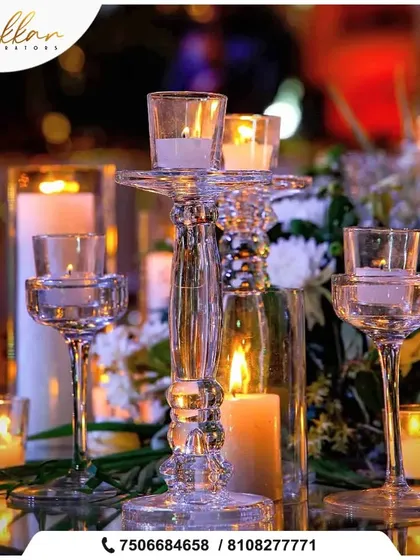 A magical candlelight setting perfect for a romantic dinner or reception. The crystal candle holders and soft glow create a mesmerizing and intimate atmosphere.