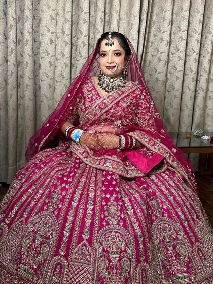 My beautiful NG bride Rinki, all ready for her wedding day. Her magenta pink lehenga was so vibrant, and I gave her a matching bold lip.