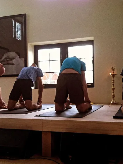 A duplicate of image 34, showing the deep backbend of Ustrasana.