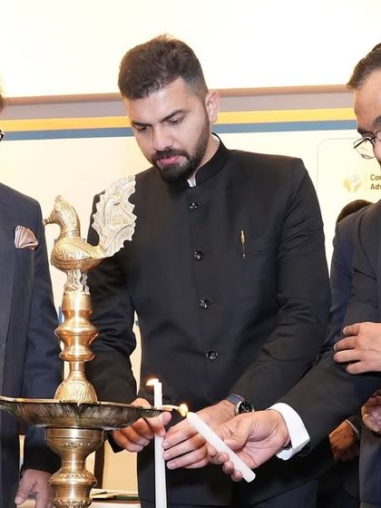 Lighting the ceremonial lamp to inaugurate the national program on preventive vigilance measures.