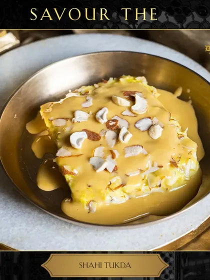 Savor the royal flavors of our Shahi Tukda, a delightful dessert of fried bread soaked in sweet, creamy rabdi.