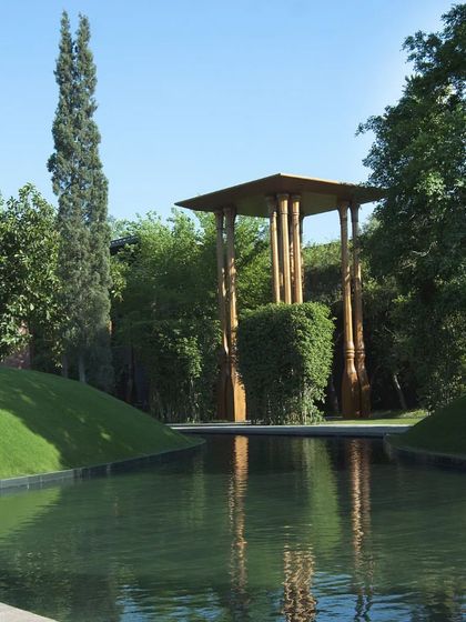 Our yoga pavilion, surrounded by water and lush greenery. It is a dedicated space for finding your balance and connecting with nature.