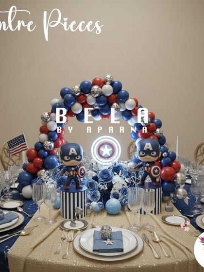 This centerpiece is designed for a Captain America fan, featuring a red, white, and blue balloon arch over the table. The illuminated shield logo and character figures make it a heroic focal point for the dining experience.