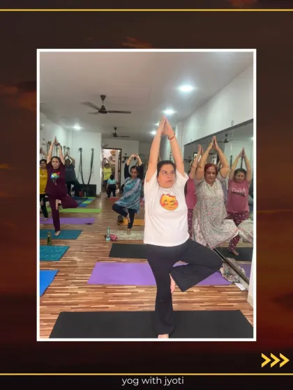 Find your balance with Tree Pose! A class of students holding Vrikshasana, each at their own level.