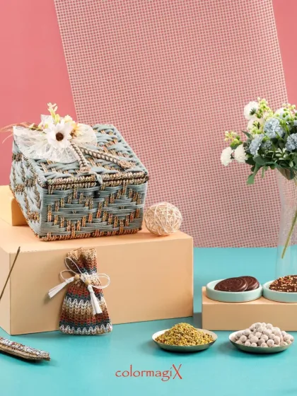 A beautifully styled shot of our grey and gold jute hamper. The natural textures and tones are complemented by the fresh flowers, creating a serene and aesthetic appeal.