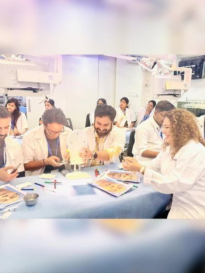 A closer look at the hands-on training session, where doctors practiced techniques on anatomical models to better understand facial anatomy.