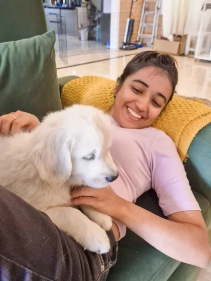 Learning to be a human couch is a key skill for any puppy trainer. Gentle handling and positive association from a young age are fundamental to my puppy training programs.