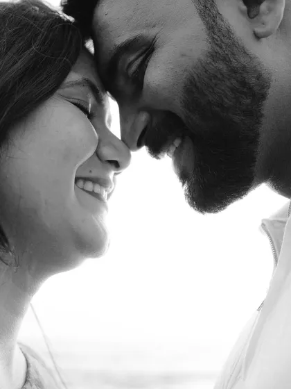 A timeless black and white close-up from a pre-wedding shoot. Stripping away color brings focus to the raw emotion and connection, creating classic portraits that will never go out of style.