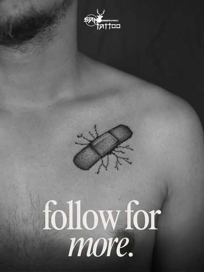 A simple but profound concept. This band-aid tattoo over the heart area symbolizes healing, resilience, and the idea that "this too shall pass." 