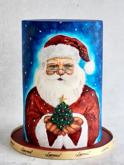 This cake is very special to me because it shows the artistic side of my craft. Our talented artist hand-painted this entire Santa Claus portrait directly onto the cake. It’s a perfect example of how a cake can be a canvas for beautiful art.