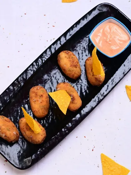 For those who like a bit of heat, our Cheesy Jalapeno Poppers are a must-try. They are filled with melted cheese and spicy jalapenos, coated in a crispy batter.