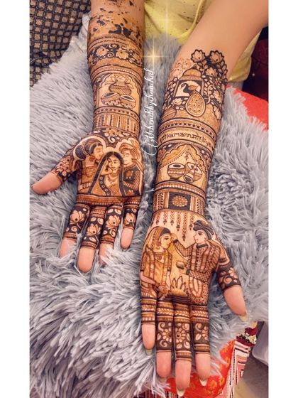 A complete view of a story-rich bridal mehendi. You can see the portraits of the couple, the family, and other ceremonial elements that make the design unique to the bride's story.