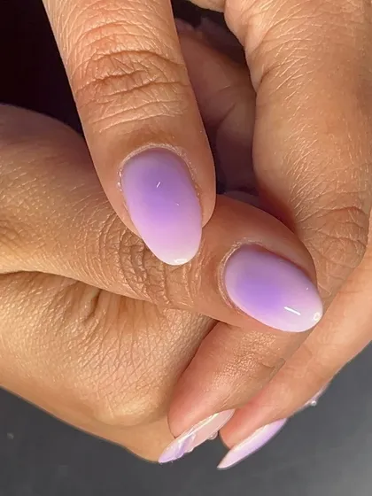 A soft and subtle lavender ombré, blending from a milky white to a beautiful pastel purple.
