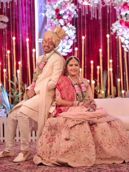 A day of joy, a lifetime of love. This couple's portrait captures the happiness of their phera ceremony.