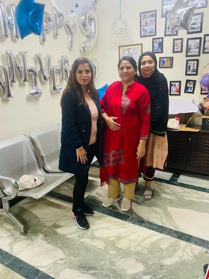 Posing with members of my dedicated team. We work together to provide the best care for our clients.