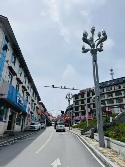 The main street of Nyalam, a crucial acclimatization stop on the Friendship Highway. The town serves as a gateway to the higher altitudes of the Tibetan plateau.