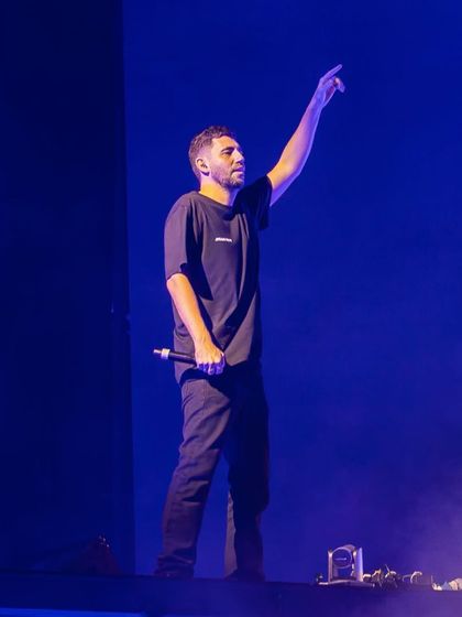 Dimitri Vegas on stage, a commanding presence at one of my massive arena shows.