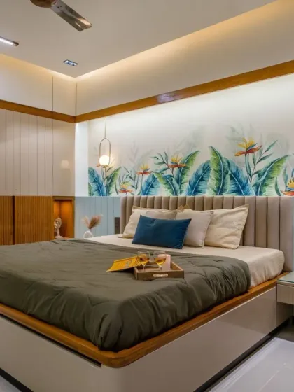 Your bedroom should be a peaceful retreat. For this master bedroom, I combined soft lighting, a custom-designed bed with a beautiful feature wall, and fluted paneling to create a space that feels both luxurious and relaxing.