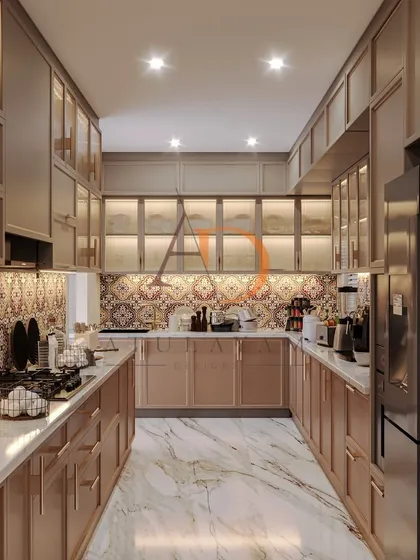A full view of the spacious parallel kitchen, with marble flooring and warm under-cabinet lighting that creates a bright and inviting workspace.