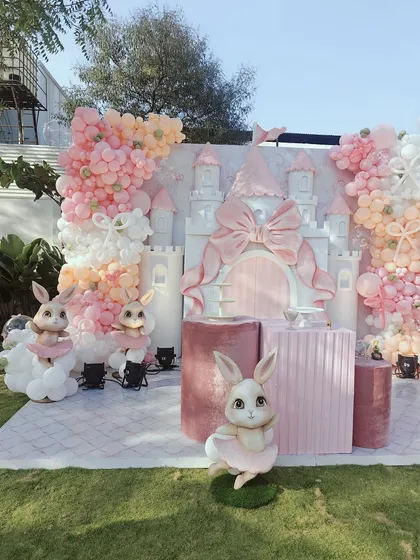A different perspective of the bunny castle theme, focusing on one of the adorable bunny props. These small details and high-quality props are what make our themed setups so special and immersive.