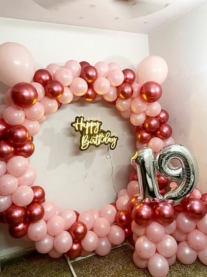 This circular balloon frame is a popular choice for creating a dedicated photo spot at any party.