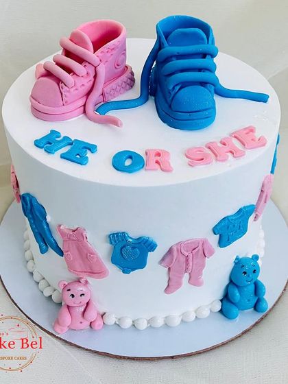 Another view of the "He or She" gender reveal cake.