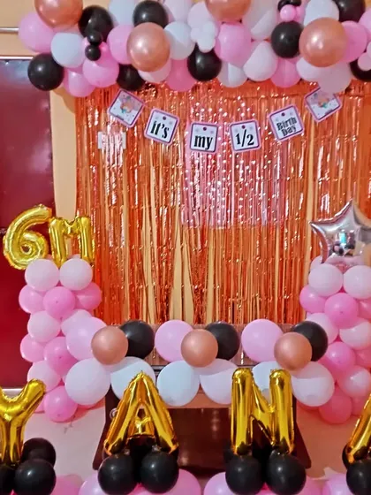 A final look at the half-birthday setup, showing how all the decorative elements come together for a memorable celebration at home.