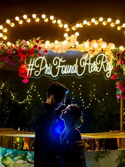 Your love story, illuminated. I love creating unique couple portraits that feel personal to you, like this silhouette against the couple's own wedding hashtag. It’s a modern, artistic way to remember your special night.