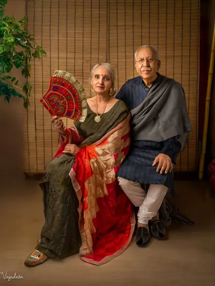 This portrait of my parents in traditional Punjabi attire is a tribute to our roots. I wanted to recreate the essence of a Punjabi village in my studio, honoring their culture and creating a memory I will cherish forever.