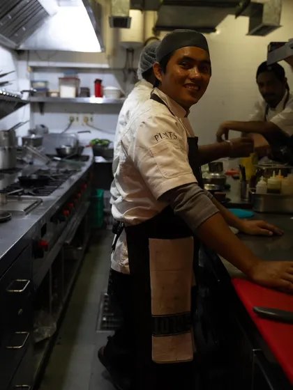A smile from the heart of our kitchen. Our team is the driving force behind every dish we serve.