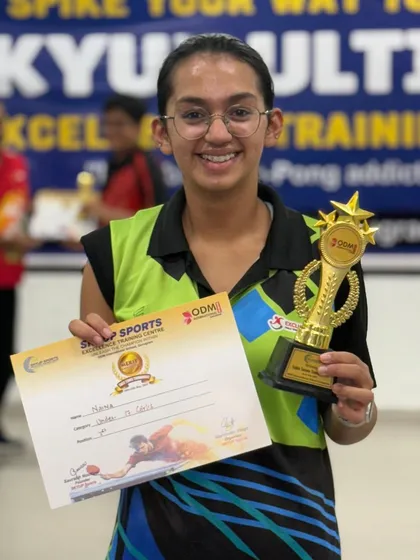 The pure happiness of a champion. Here is one of our star players, Naina Rekhi, proudly displaying her 1st place trophy and certificate from the SkyUp Open Table Tennis Tournament. Her success in the Under 17 Girls category is an inspiration.