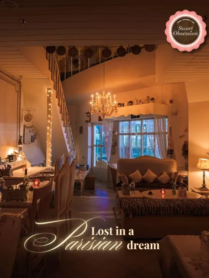 I want my guests to feel like they are lost in a Parisian dream. This shot captures the magical ambiance at night, with soft lighting and elegant decor creating a truly enchanting experience.