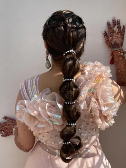 The full back view of the heart-braid and bubble ponytail, a true work of art.