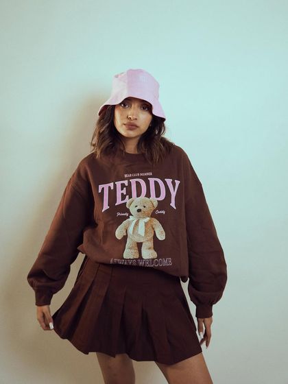 A classic fashion pose by Diksha Rawat. This shot is perfect for a lookbook, showing the outfit clearly while maintaining a stylish and engaging feel.