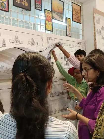 A moment of deep engagement with a student's project at the REVA exhibition. I always make time to understand the thought process behind the work and offer constructive reflections.