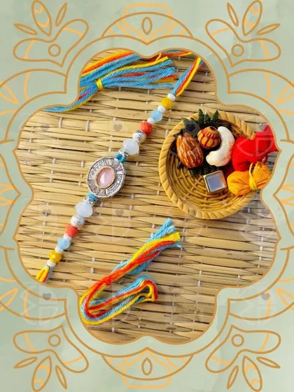A vibrant, multi-colored thread rakhi with a beautiful stone centerpiece. It's a simple yet elegant choice to celebrate your bond.