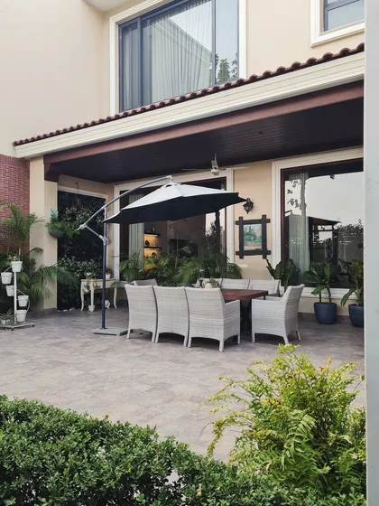 This backyard is the perfect blend of classic farmhouse warmth and serene outdoor living. It is a space designed for slow mornings, cozy evenings, and endless memories.